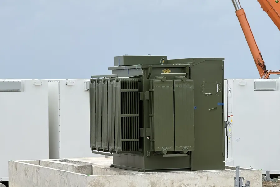 Transformer being set on its foundation